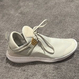 Jordan Cream Athletic Shoes with Unique Lacing System